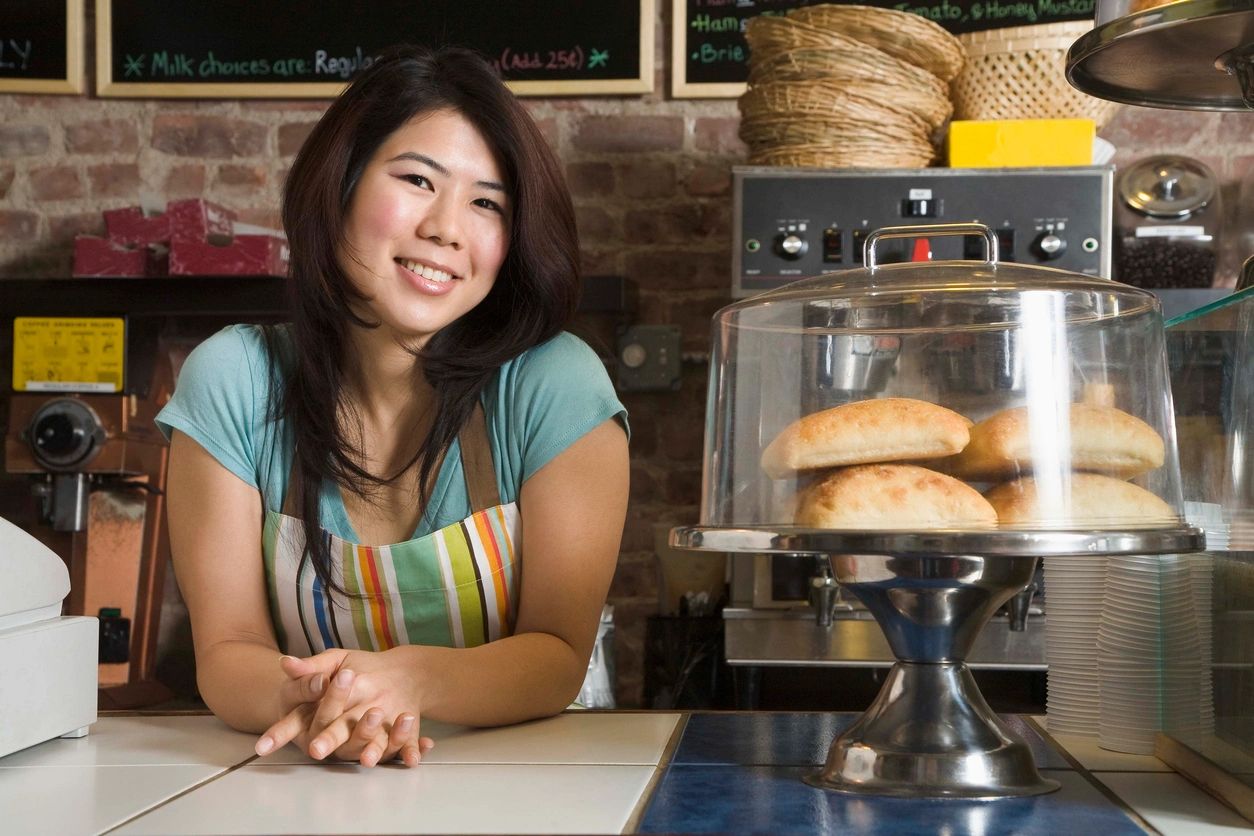 A picture of a woman wearing an apron