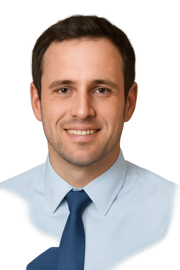 Professional headshot of a smiling man in a light blue shirt and navy tie, used as a testimonial avatar
