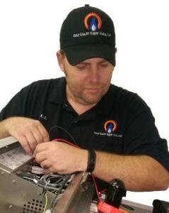 Technician repairing equipment with focus. Technician repairing equipment with focus.
