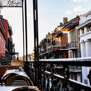 French Quarter balcony view in New Orleans with historic buildings and restaurants